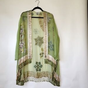 Ania.A silk green floral kimono with beaded fringe